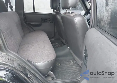 2001 Jeep Cherokee Limited/Sport из США, поврежденный, VIN 1J4FF58S81L514104